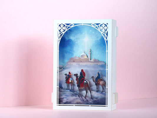 Jesus Birth. Holy Night Star, Epiphany. The Nativity Scene of Jesus Birth pop up paper box card. Three Kings, Magi, Gifts. Camels