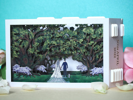 Oak park alley wedding invitation. Paper pop-up box cards. Wedding stationary. Bride and groom figures, cat, trees.