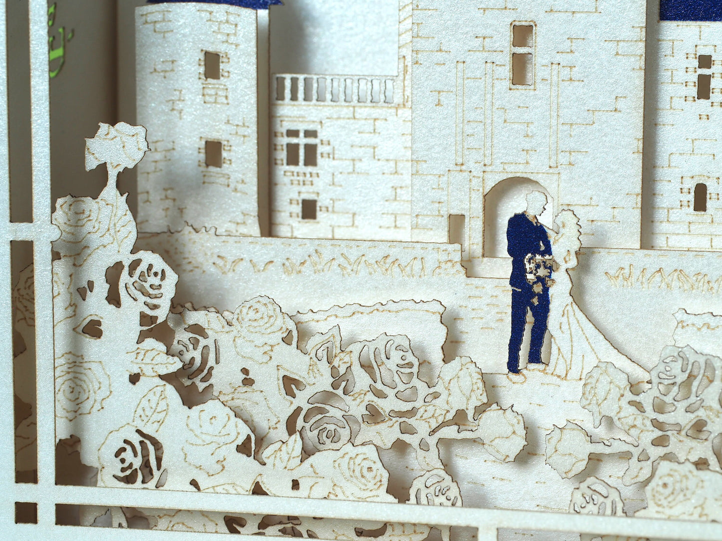 Château du Rivau laser cut design with paper bride and groom figures
