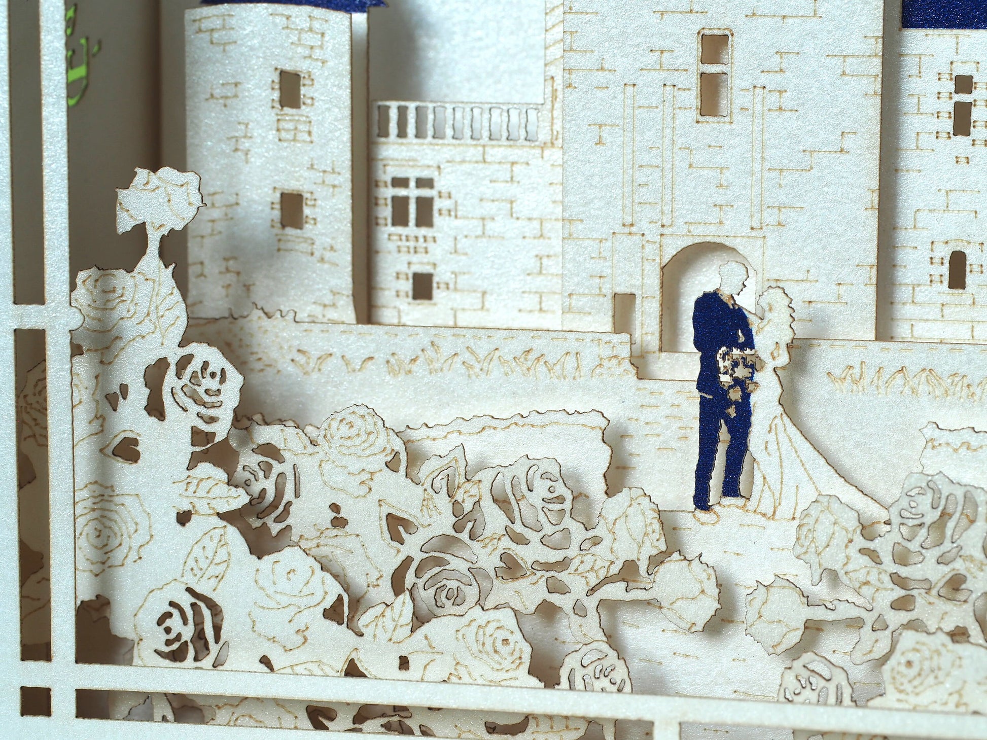 Château du Rivau laser cut design with paper bride and groom figures