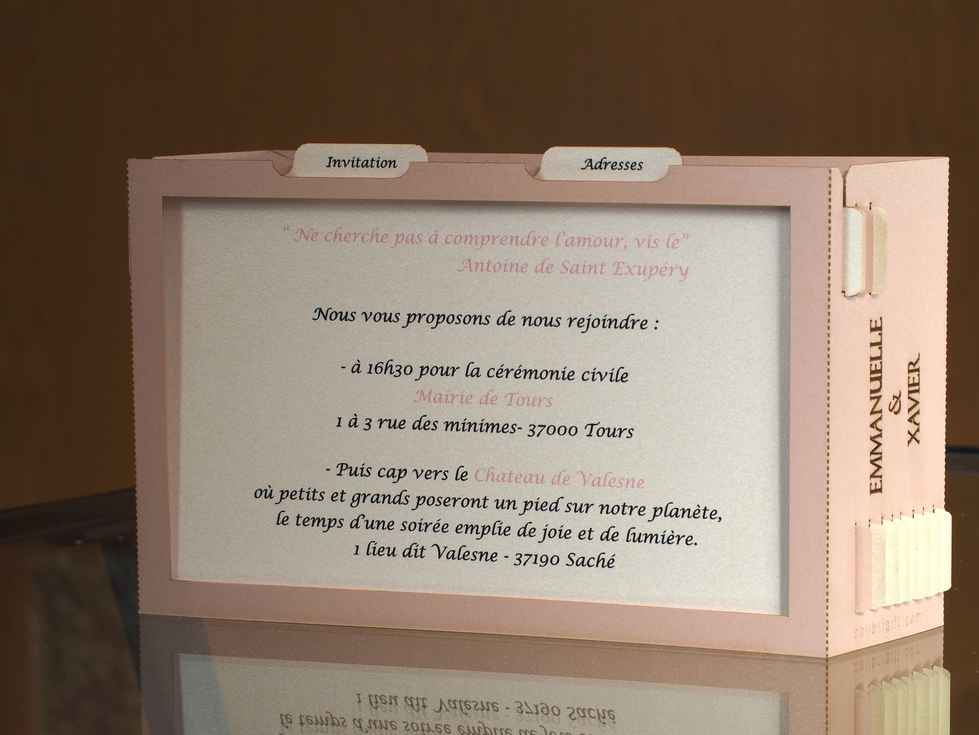 Pop up paper card with pink box and custom laser cut text, wedding invitation that folds flat and has layers inside. Design as a small architecture model of Chateau de Valesne France.