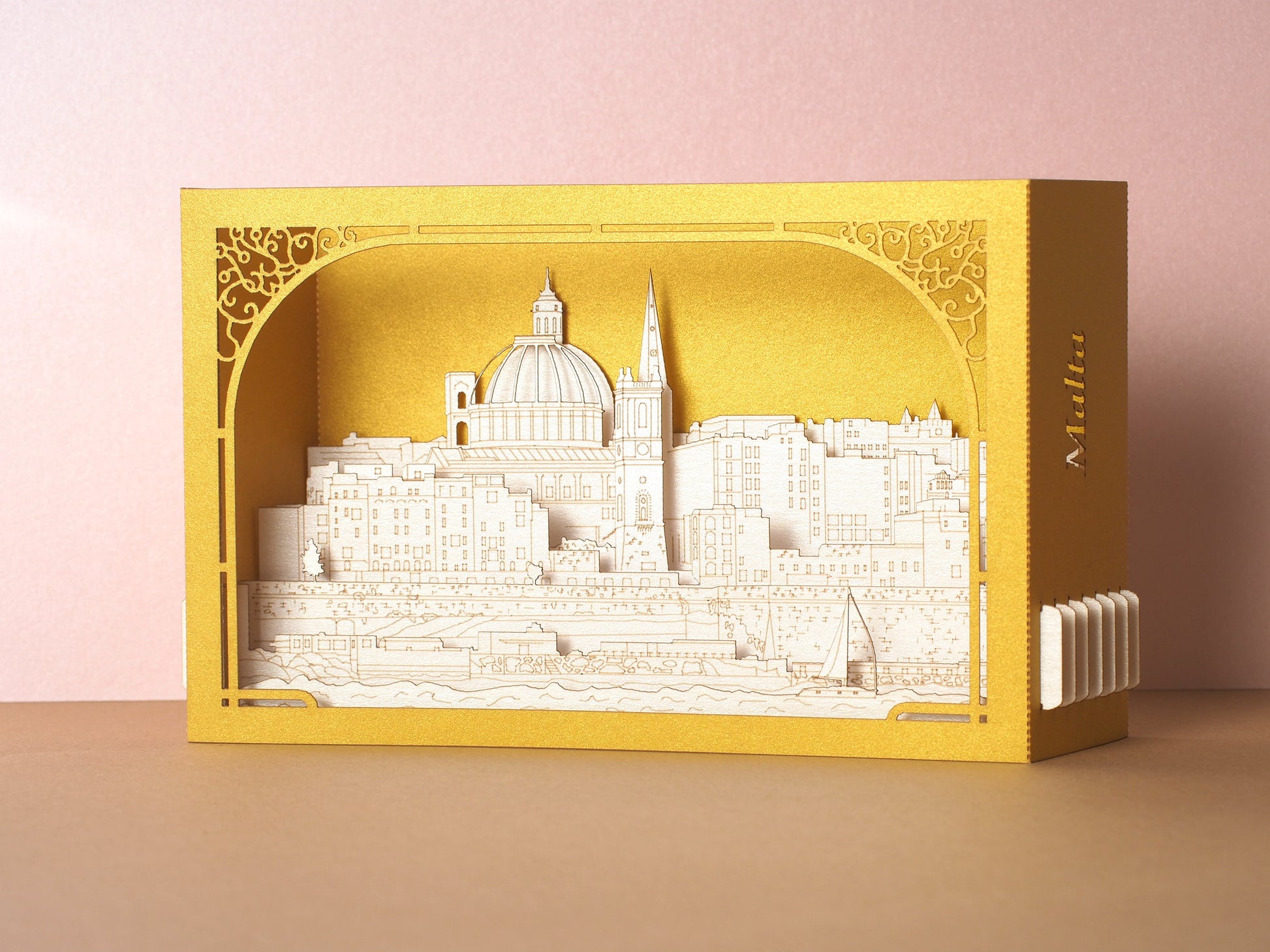 Paper 3d pop up card with Malta famous landmarks inside the box. Golden color paper box. Best gift idea for people who visited Malta as a souvenir