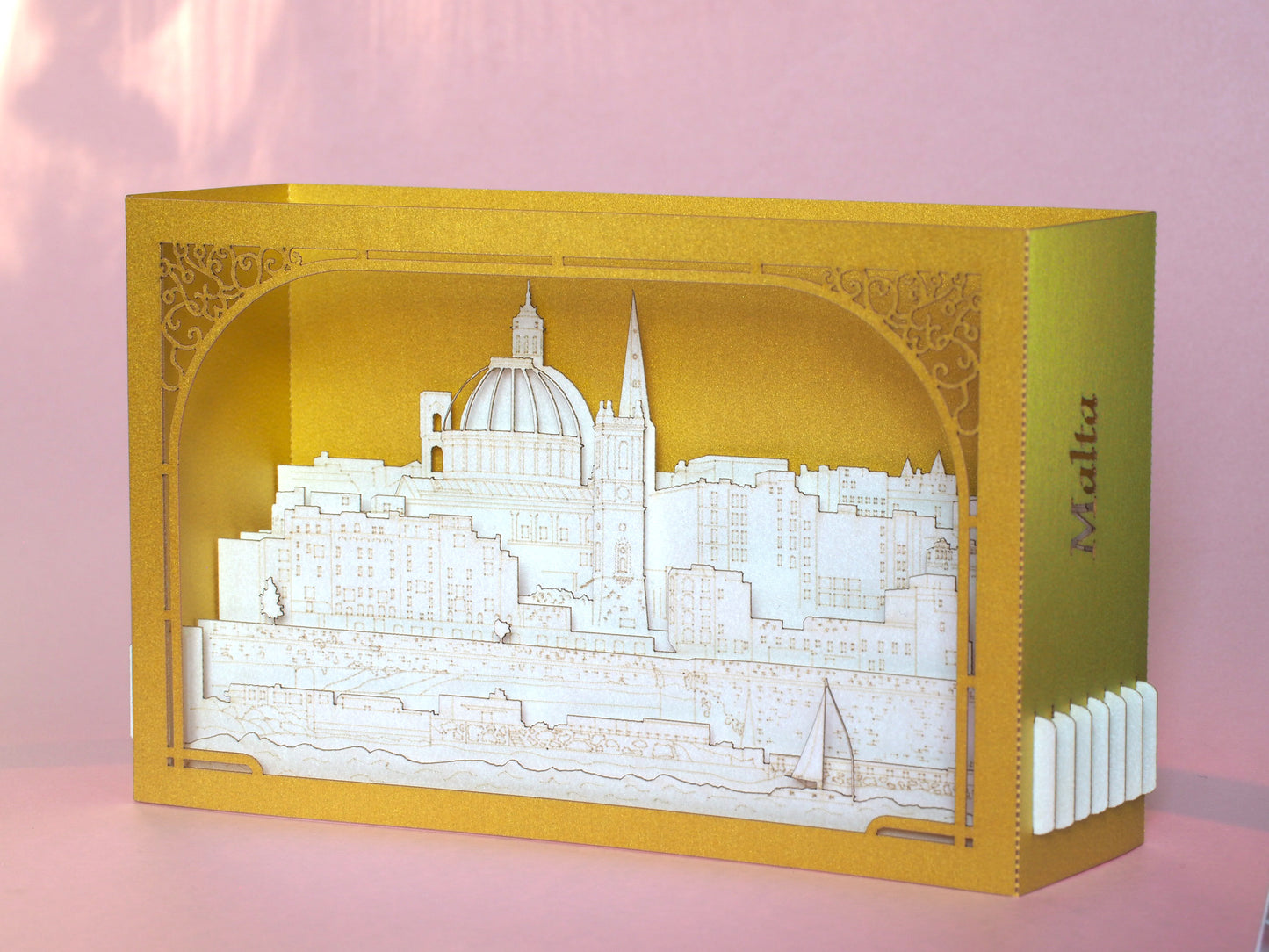 Paper 3d pop up card with Malta famous landmarks inside the box. Golden color paper box. Best gift idea for people who visited Malta as a souvenir