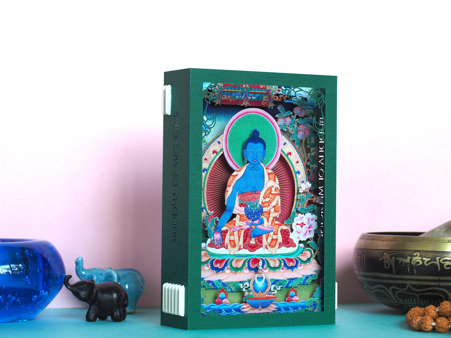 Buddha of Medicine. Paper pop up 3d shadow box card. Icon miniature folded. Yoga, teacher, meditation.