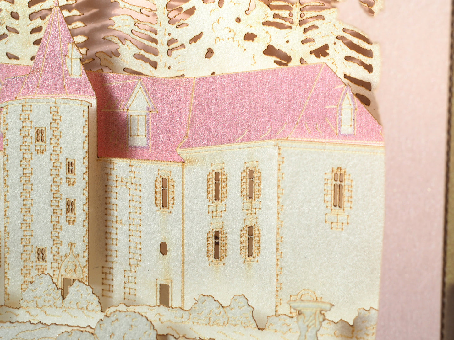 Pop up paper card with pink box and custom laser cut text, wedding invitation that folds flat and has layers inside. Design as a small architecture model of Chateau de Valesne France.