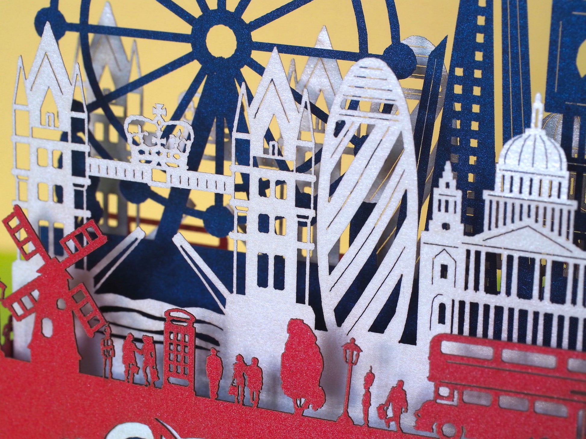 England flag. Paper pop up miniature. English Landmarks. Red Telephone, taxi, bus, Big Ben, Tower Bridge, The Needles, St Paul’s Cathedral