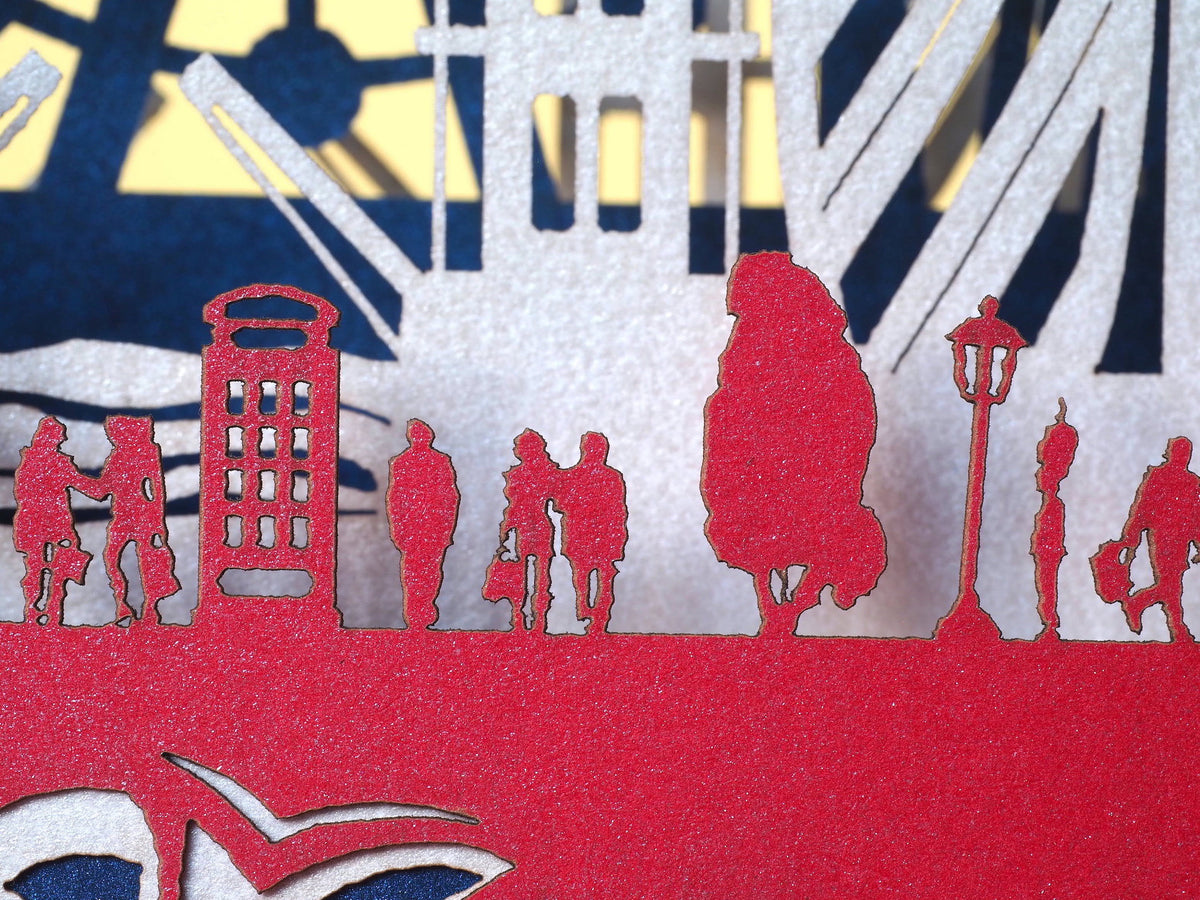 England flag. Paper pop up miniature. English Landmarks. Red Telephone, taxi, bus, Big Ben, Tower Bridge, The Needles, St Paul’s Cathedral