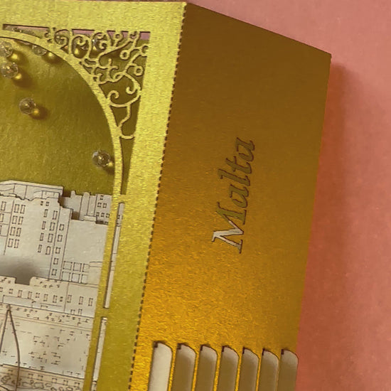 Paper 3d pop up card with Malta famous landmarks inside the box. Golden color paper box. Best gift idea for people who visited Malta as a souvenir