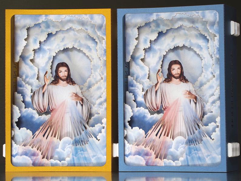 Divine Mercy (Catholic devotion) icon with Jesus - paper pop up card in gold color frame, two  rays- blue and red 