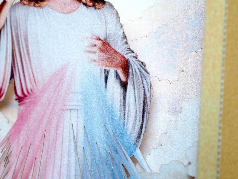 Divine Mercy (Catholic devotion) icon with Jesus - paper pop up card in gold color frame, two  rays- blue and red 