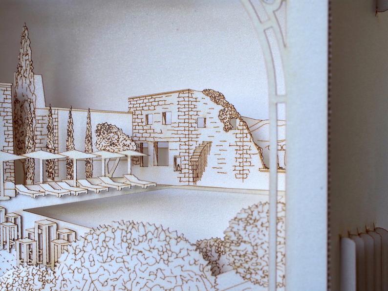 Paper laser cut invitation with French Hotel design