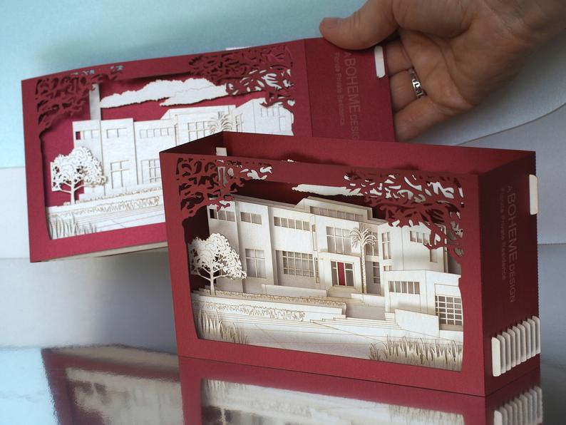 3D architecture pop up card made as a paper building model, custom promotional greeting card for corporate marketing, client gifts and business events.